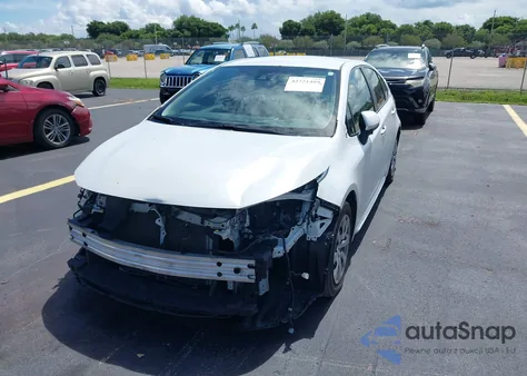 2022 Toyota Corolla Le z USA, uszkodzony, nr VIN JTDEPMAE1N3011596